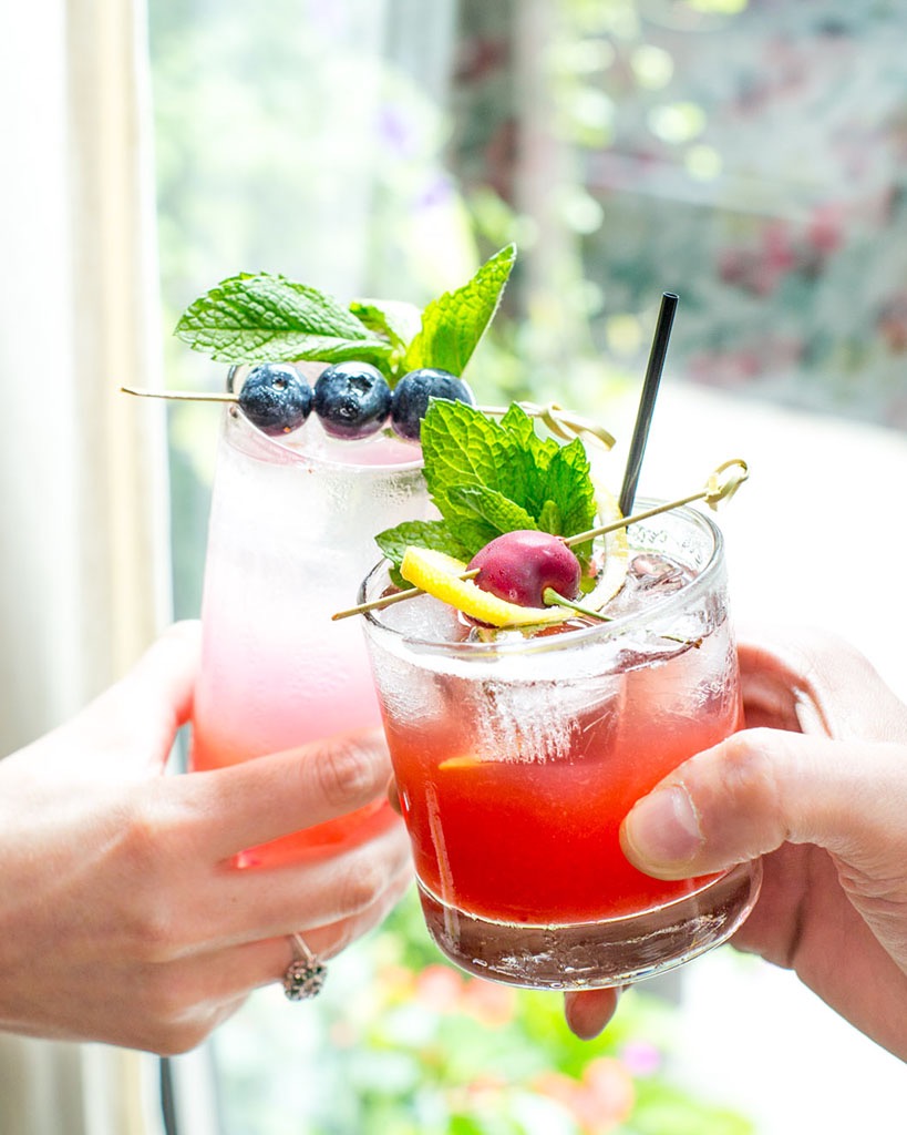 Cocktails being toasted